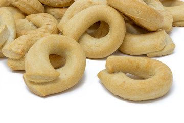 Italian taralli on a white background macro photography
