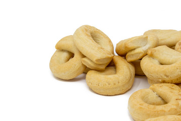 Italian taralli on a white background macro photography