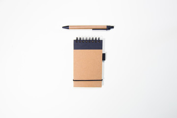 Brown notebook in white background