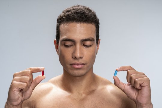 Good-looking Man Beginning His Day With Taking Meds