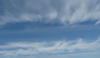 blue sky and an unusual white clouds in October