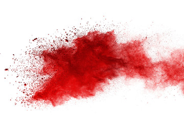 Red powder explosion on white background. Colored cloud. Colorful dust explode. Paint Holi.