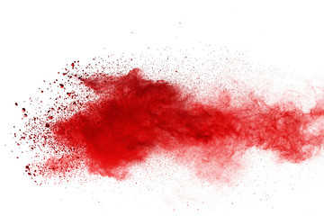 Red powder explosion on white background. Colored cloud. Colorful dust explode. Paint Holi.
