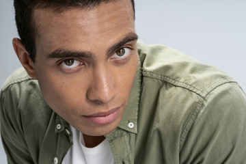 Man looking out of the corners of his eyes