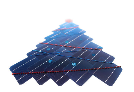 The solar battery in the form of a Christmas tree