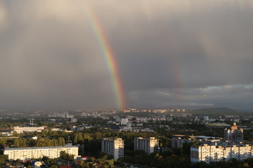 Naklejka na ściany i meble Rainbow after rain over the city