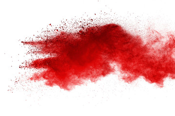 Red powder explosion on white background. Colored cloud. Colorful dust explode. Paint Holi.