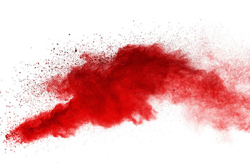 Red powder explosion on white background. Colored cloud. Colorful dust explode. Paint Holi.