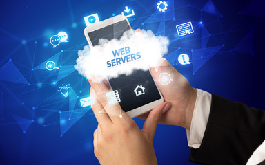 Female hand holding smartphone with WEB SERVERS inscription, cloud technology concept
