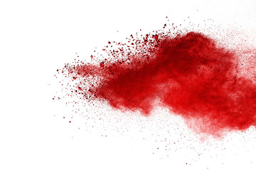 Red powder explosion on white background. Colored cloud. Colorful dust explode. Paint Holi.