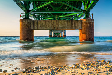 Mackinaw Bridge Cement and Iron Work  Perspective Directly Under Bridge During Wavey Sunset