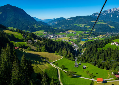 Beautiful landscape with Hohe Salve alps mountains and gondola cable lift transportation in Soll, Tyrol, Austria. Aerial view.