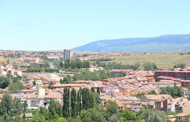 Fototapeta premium Terracotta roof tiles building old town cityscape Segovia Spain