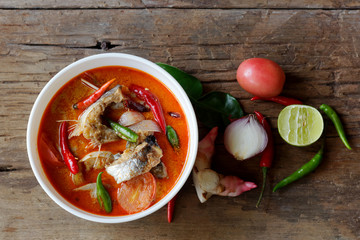Catfish in sour and spicy creamy Tom Yum soup in bowl