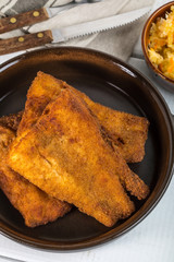 Pieces of cod in breadcrumbs.