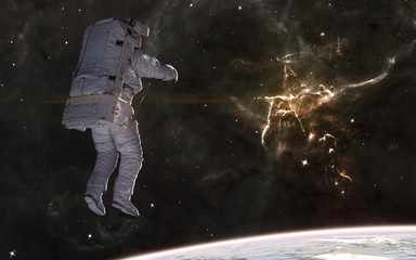 Mystic Mountain of Carina Nebula. Astronaut, planet landscape, deep space. Science fiction....