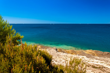 Fototapeta na wymiar Mediteranean sea coast landscape, blue clear sky and sea.