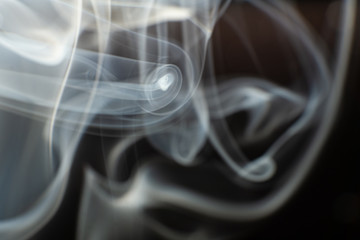 Fototapeta premium Beautiful smoke on black background