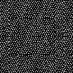 Embroidered black and white seamless pattern. Geometric print for textiles. Hand-drawn carpet ornament. Ethnic and tribal motifs. Vector illustration.