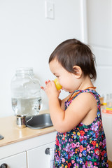 Toddler Girl with Play Kitchen