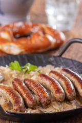 grilled nuremberger bratwurst with sauerkraut