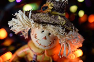 Closeup of Adorable Scarecrow Face illuminated by Halloween Led Lights