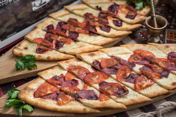Turkish Pide with Meat, Cheese and Tomato