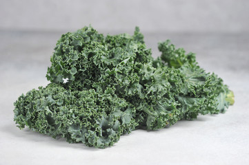 Cabbage kale on a light background. The concept of healthy, proper nutrition. Close-up.