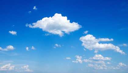 white clouds against blue sky