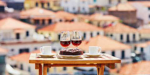 Madeira wine, coffee and hohey cake, View to Funchal, Portugal