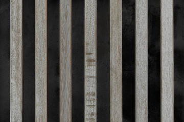 Detalle de fachada formada por piel de listones de madera