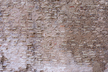 Fondo con textura de muro antiguo de tapial formado por tierra compactada y ladrillo