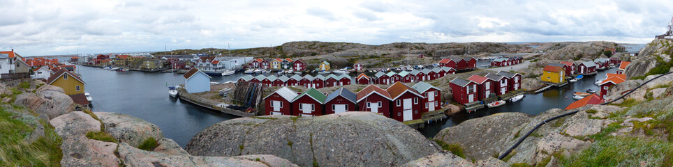 Fototapeta na wymiar Smogen town, Smogenbrygga. Wood houses of fishermen, of different colors. Bohuslan. Sweden
