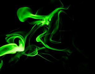 Fototapeta premium Green smoke on black background