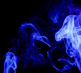 Fototapeta premium Blue smoke on black background