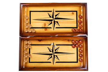Dice and checkers on a wooden backgammon board over white background.