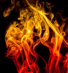 Colored smoke on black background