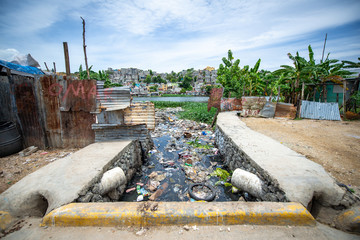 Santo Domingo, La Altagracia / Dominican Republic - May 15 2018: Aqueduct Full Of Garbage And Waste...