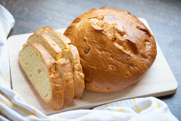Closeup photo of pumpkin bread on wooden cutting broad