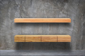 Empty wood plank shelves on grunge concrete room background. Mockup for display or montage of product or design.