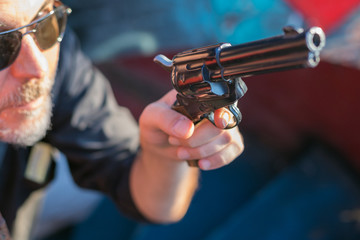 hand holding a gun replica at gunflght