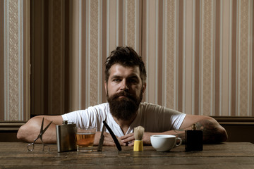 Barbershop. Sandalwood shaving cream. Barber shop. Bearded man. Making haircut look perfect in...