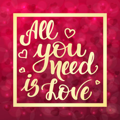 All you need is love. Motivational and inspirational handwritten lettering on blurred bokeh background with hearts. Vector illustration for posters, cards and much more.