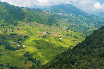 Naklejka na ściany i meble Spectacular rice terraces in mountain valley. Aerial view