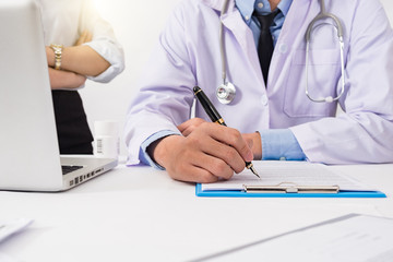 Doctor consulting patient hands closeup. medical service, consultation or education