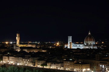 Fototapeta premium Night cityscape of the Florence at the sunset time from area of Michelangelo. Duomo Santa Maria Del Fiore and tower of Palazzo Vecchio