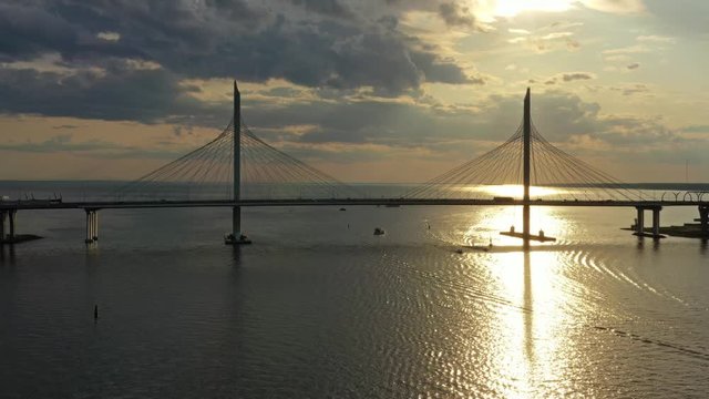 Aerial view of cable-stayed bridge in St.Petersburg during sunset, 4k