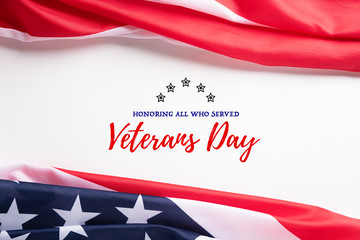 Happy Veterans Day. American flags with the text thank you veterans against a white background. November 11. - obrazy, fototapety, plakaty