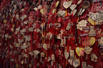 The wishing wall in DuJiangyan heritage in China.various kinds of wishing cards