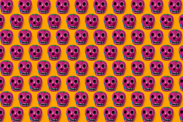 Texture of skulls and colorful handmade skulls of the day of the dead tradition in Mexico